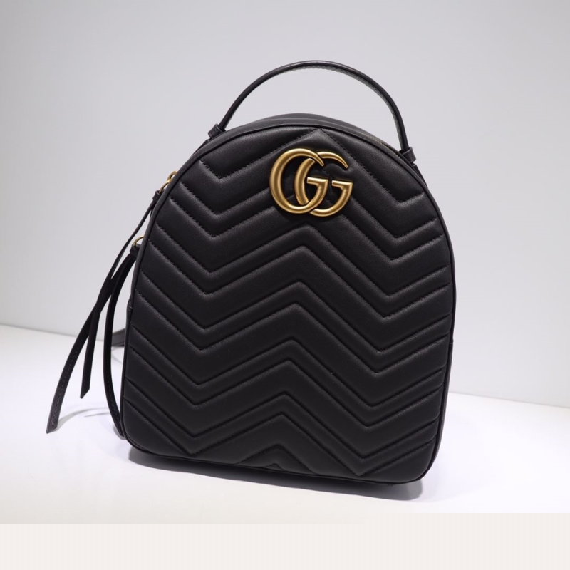 G*u*i backpacks